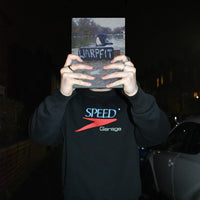 Black embroidered garage jumper