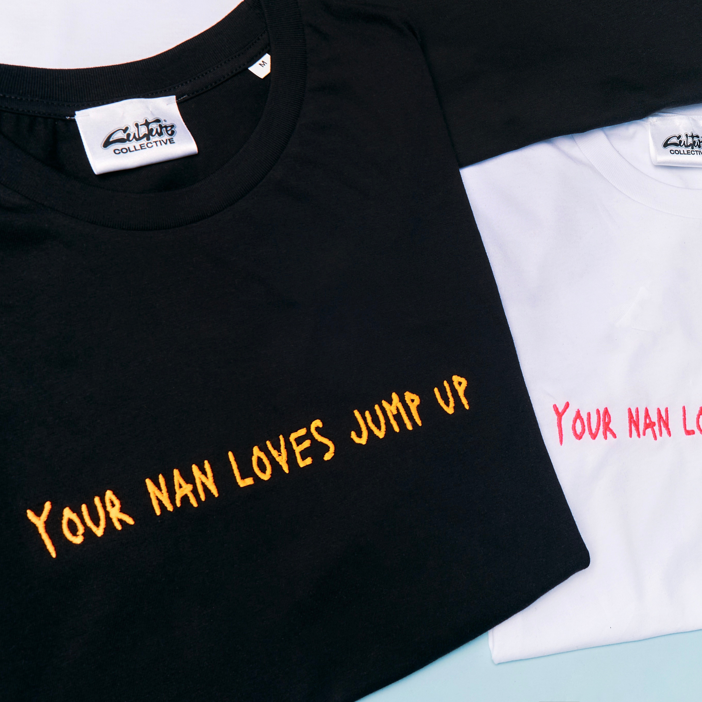 YOUR NAN LOVES JUMP UP TEE BLACK